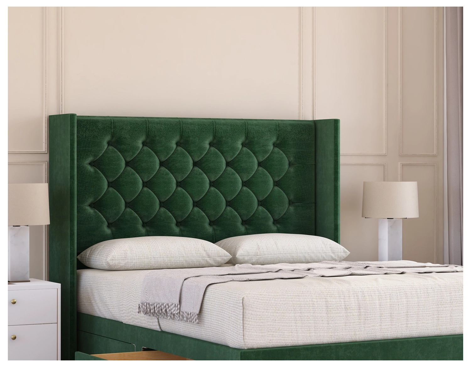 A luxurious green velvet headboard featuring a buttoned upholstery design, adding elegance to any bedroom decor.